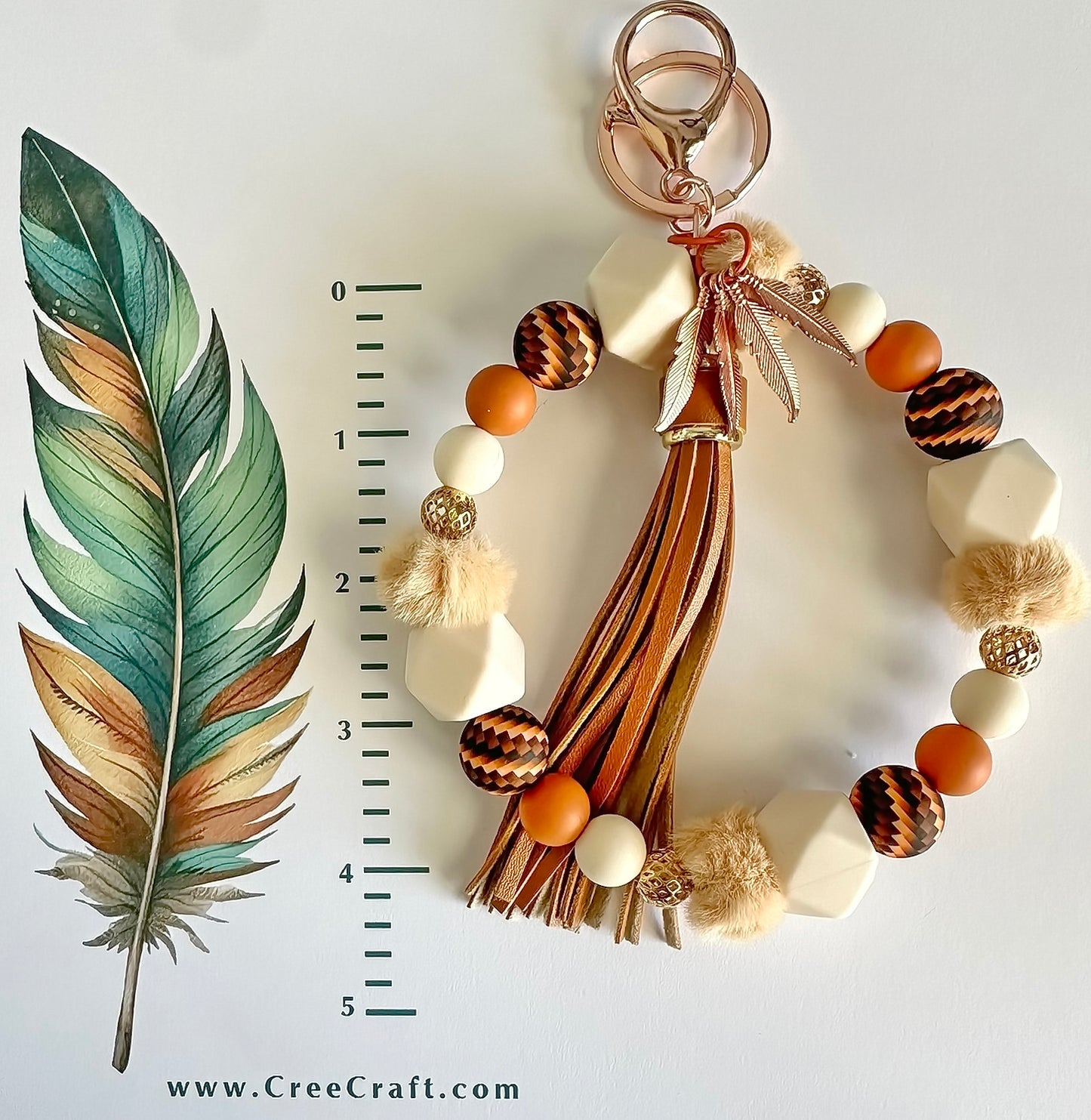 Pochette-bracelet - Plumes