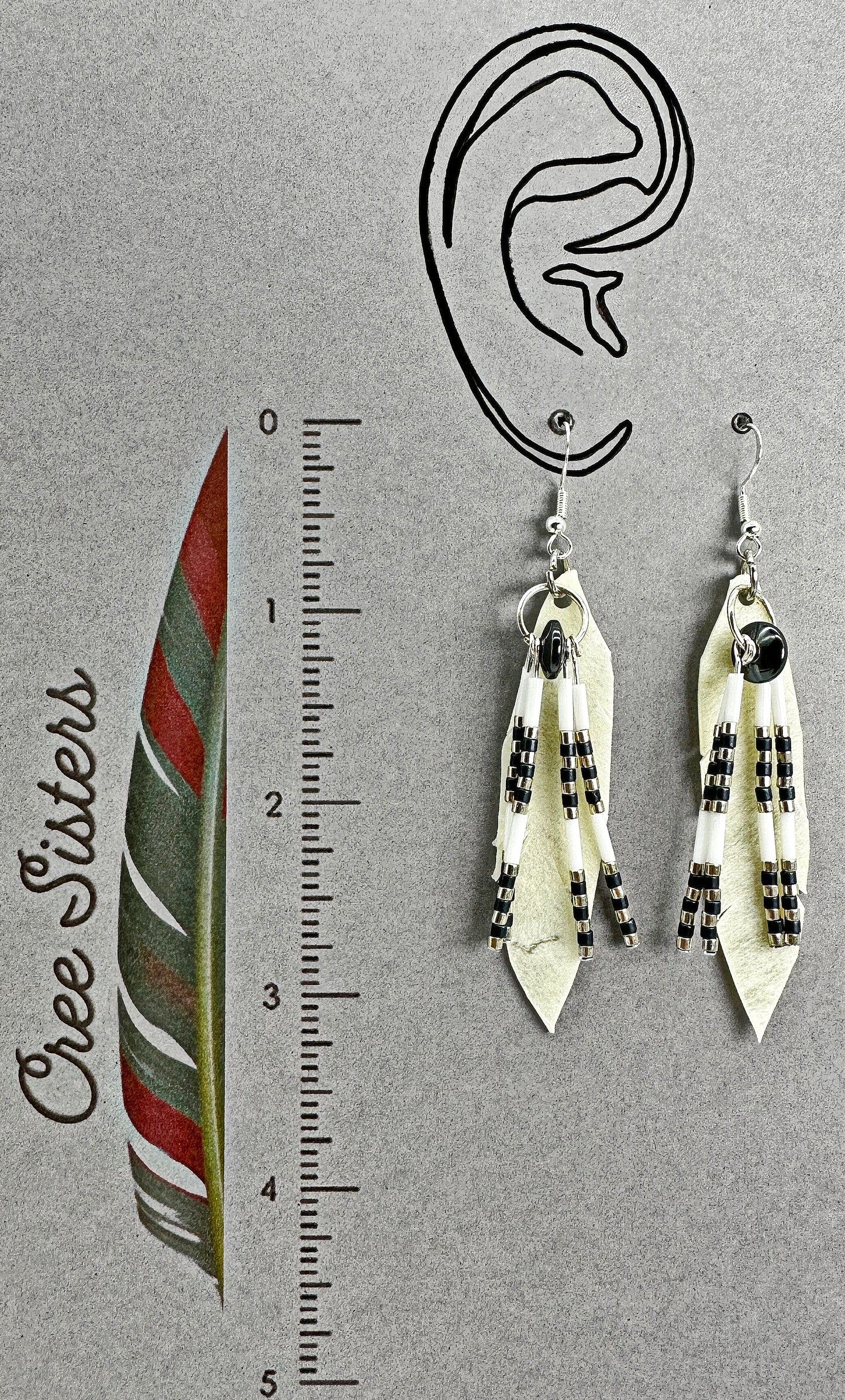 Boucles d'oreilles artisanales indigènes - Série Rawhide Plume avec hématite