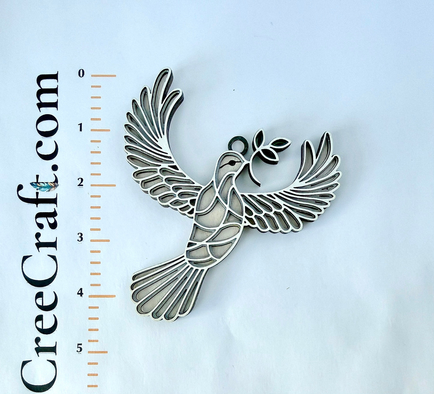 Flying Creature Ornaments -Birds, bees, and other winged wonders - handcrafted to bring movement and meaning to your space.